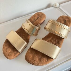 Beautiful golden sandals by Walking Cradles.